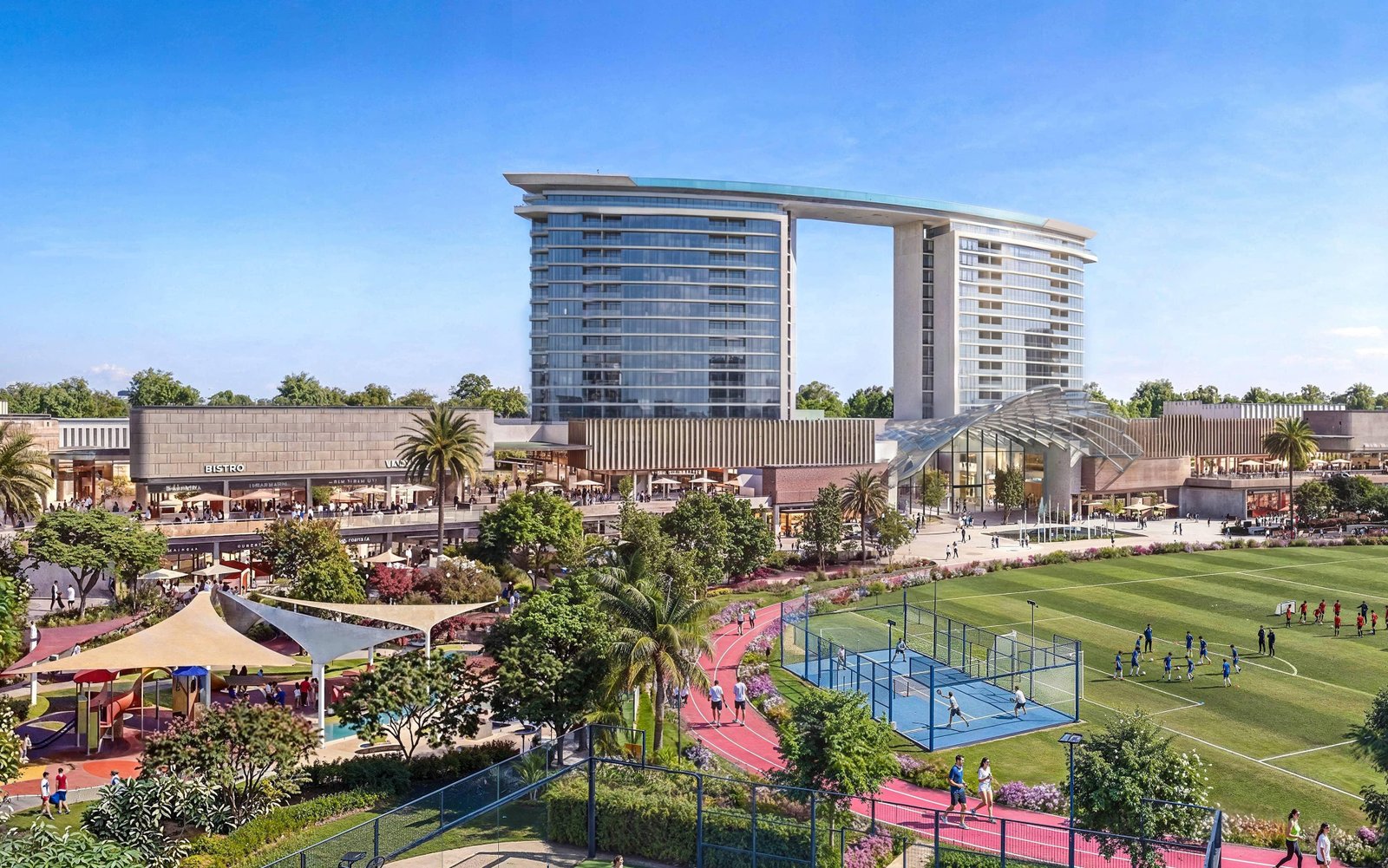 Green community boulevard at Sobha City Abu Dhabi Phase 1 featuring tree‑lined paths and luxury residential ambiance